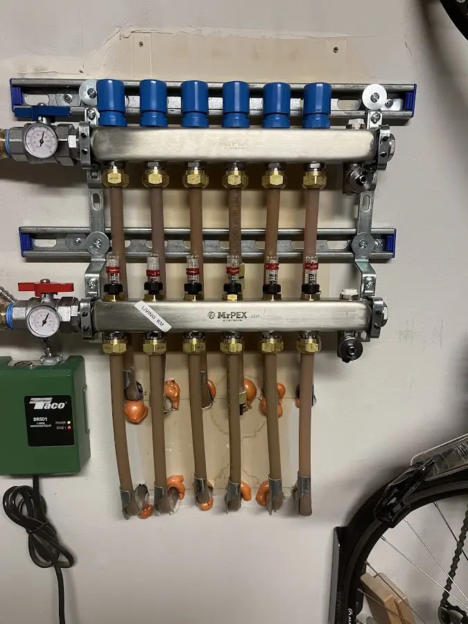 Plumber performing Gas Line Installation at a residential property in Ringgold